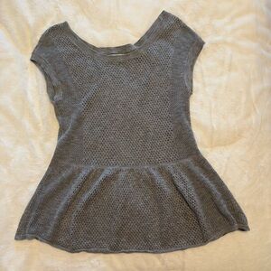 Loose knit peplum top